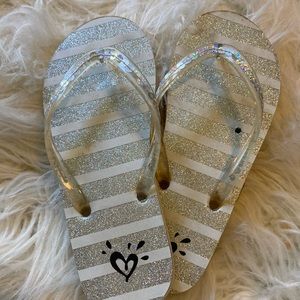 Justice flip-flops with glitter stripes